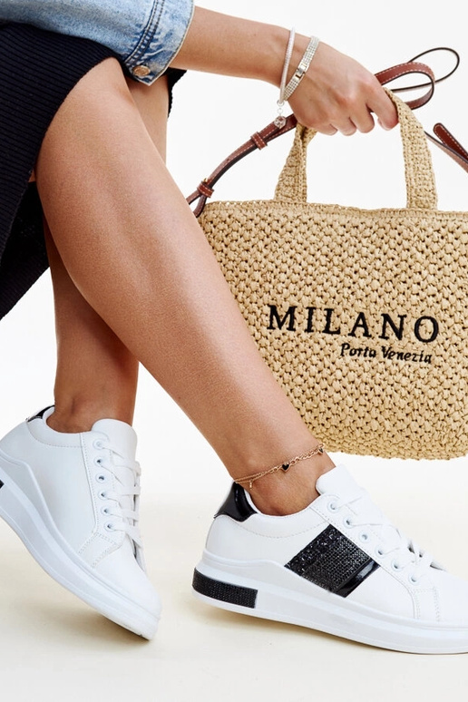 Schwarze und weiße Sneakers mit...