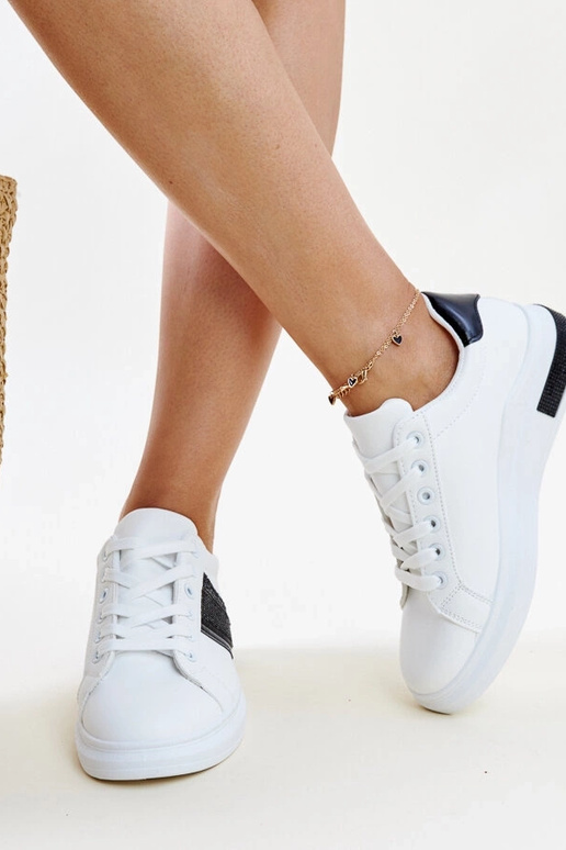 Schwarze und weiße Sneakers mit...