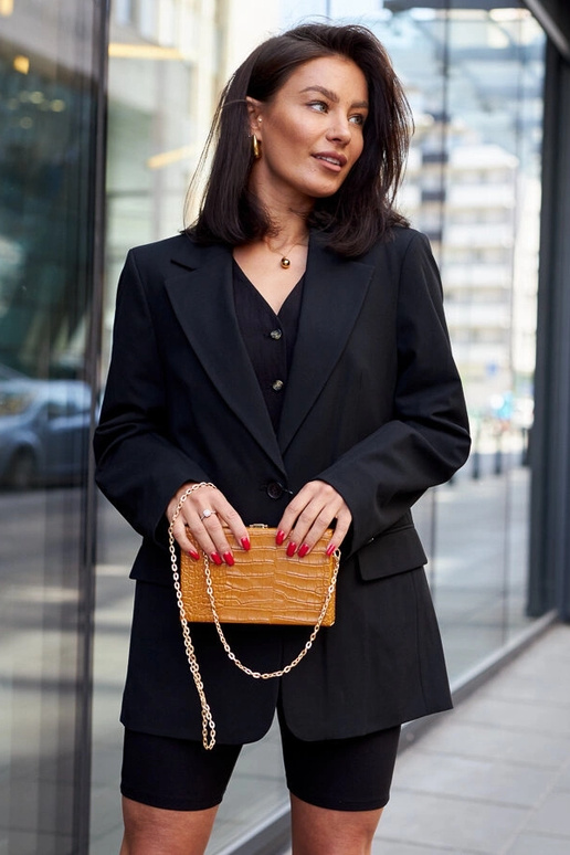 Gelbe „Trunk“-Tasche an einer Kette...