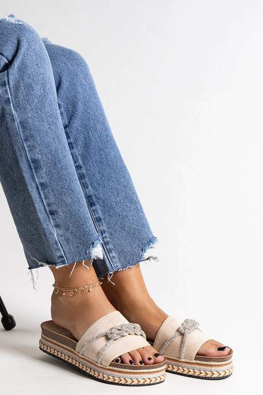 Beige Flip-Flops verziert mit...