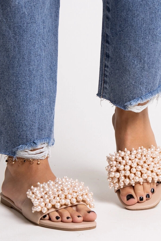 Beige Flip-Flops verziert mit... Beige Flip-Flops verziert mit...