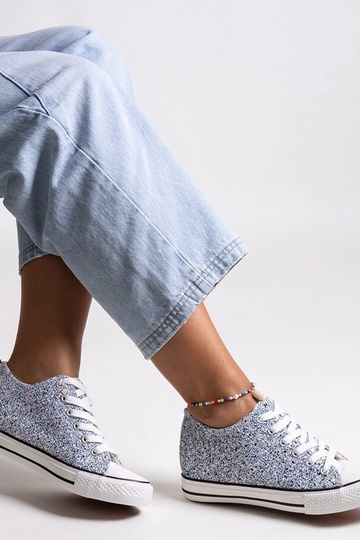 Blaue glänzende hohe...