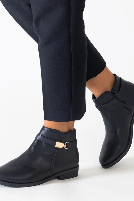 Schwarze Stiefel mit goldenen...