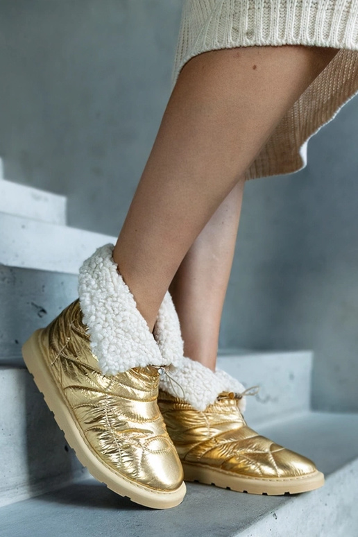 Goldene gefütterte Schneestiefel mit...