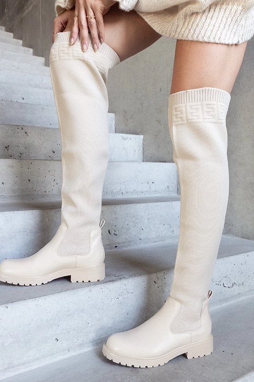 Beige Lange Stiefel mit elastischem... Beige Lange Stiefel mit elastischem...