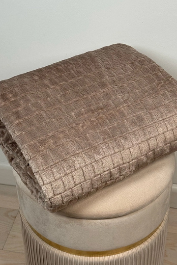 Beige gesteppte Decke 2
