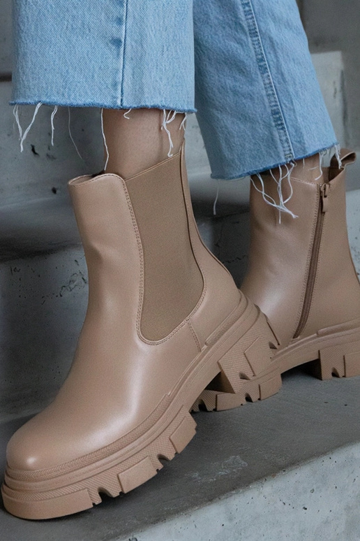 Beige warme Stiefeletten mit... Beige warme Stiefeletten mit...