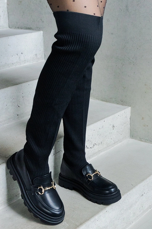 Schwarze Stiefel mit elastischem... Schwarze Stiefel mit elastischem...