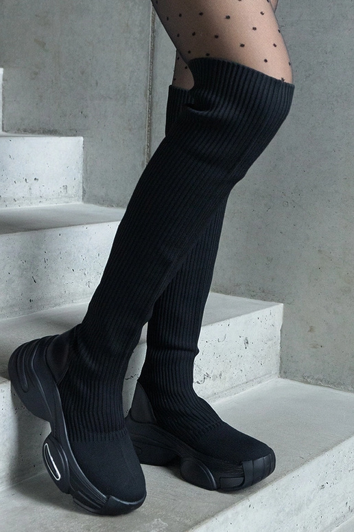 Schwarze Slip-On-Stiefel mit...