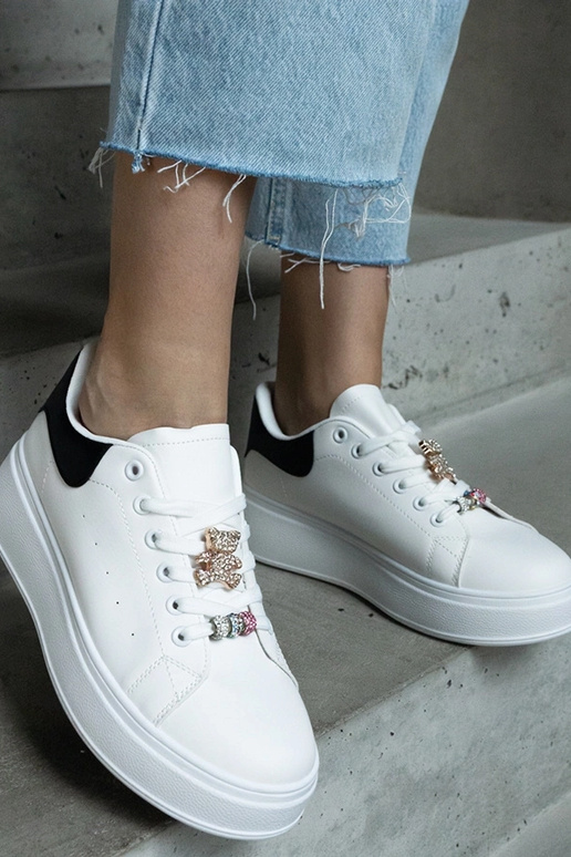 Weiße Plateau-Sneakers verziert mit... Weiße Plateau-Sneakers verziert mit...