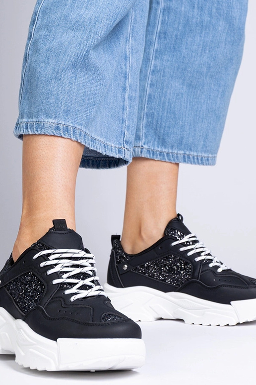 Schwarze Damensneaker mit... Schwarze Damensneaker mit...