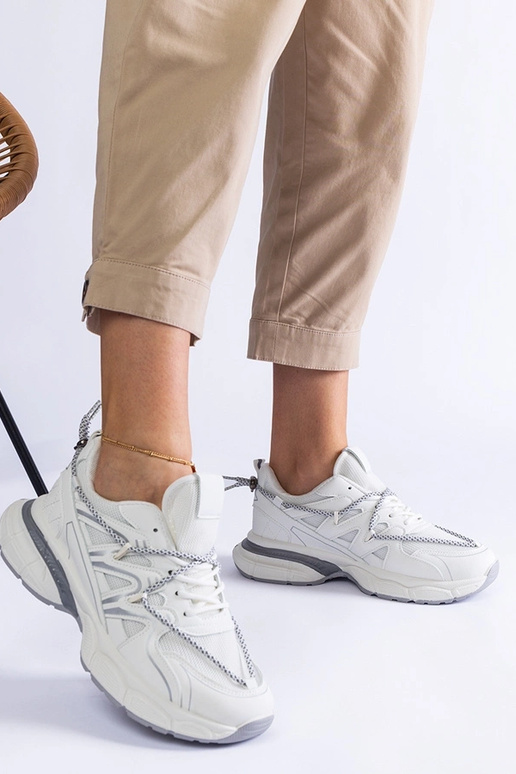 Weiße Damen Sneaker mit massiver... Weiße Damen Sneaker mit massiver...