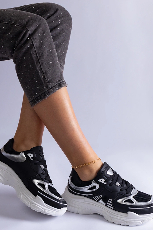 Schwarze Damen-Sneaker mit silbernen... Schwarze Damen-Sneaker mit silbernen...