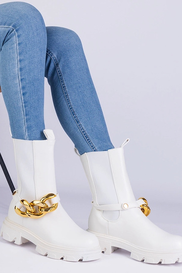 Weiße Stiefeletten verziert...