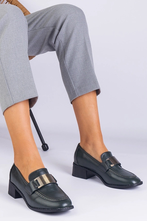 Grüne Damenschuhe mit hohen Absätzen...