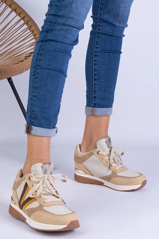 Braune Damen-Sneaker mit verstecktem... Braune Damen-Sneaker mit verstecktem...