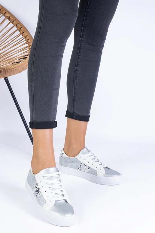 Silberne Damen-Sneaker mit Tiermotiv... Silberne Damen-Sneaker mit Tiermotiv...