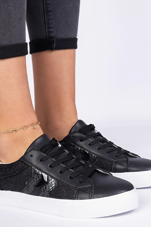 Schwarze Sneakers mit Tiermotiv und... Schwarze Sneakers mit Tiermotiv und...