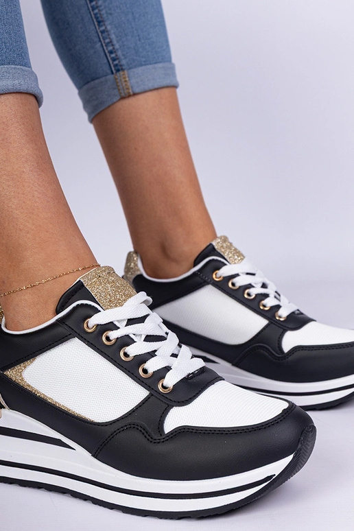 Schwarze Sneakers mit Glitzer und... Schwarze Sneakers mit Glitzer und...