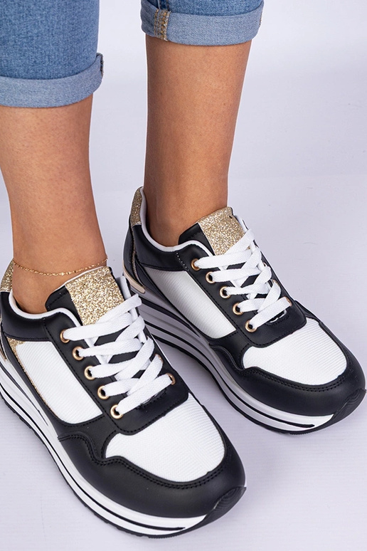 Schwarze Sneakers mit Glitzer und... Schwarze Sneakers mit Glitzer und...