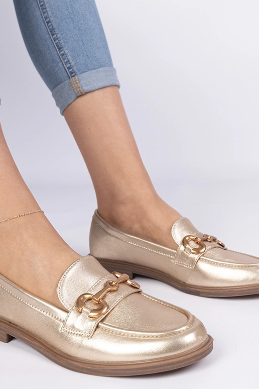 Goldene Damenmokassins mit goldener... Goldene Damenmokassins mit goldener...