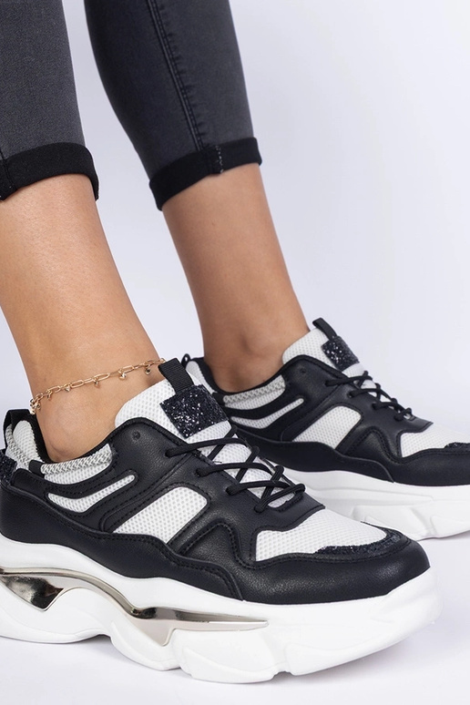 Schwarze sportliche Damen-Sneakers...