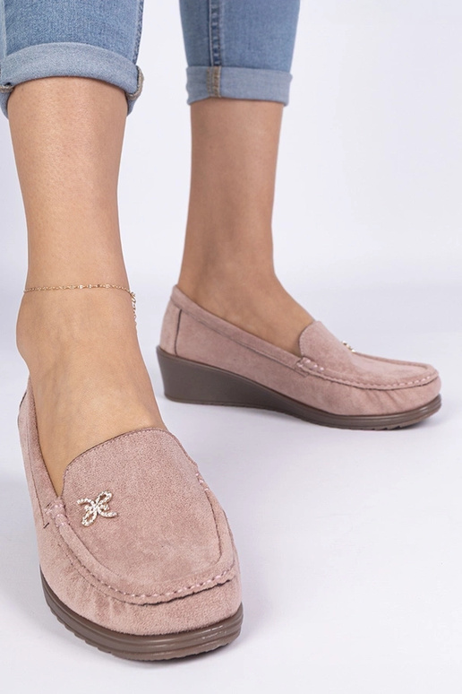 Rosa Damenmokassins auf Plateau aus...