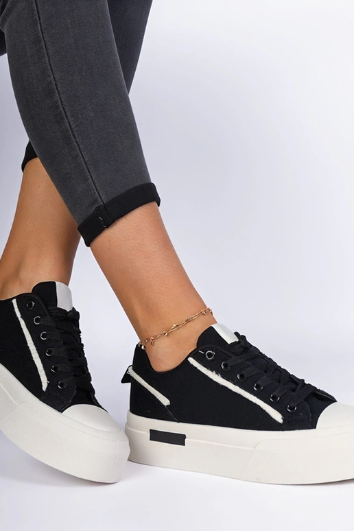 Schwarze Damendoppschuhe aus Stoff... Schwarze Damendoppschuhe aus Stoff...