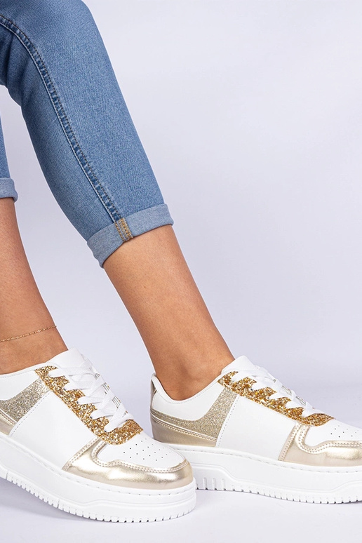 Goldene Damensneaker auf dicker Sohle... Goldene Damensneaker auf dicker Sohle...