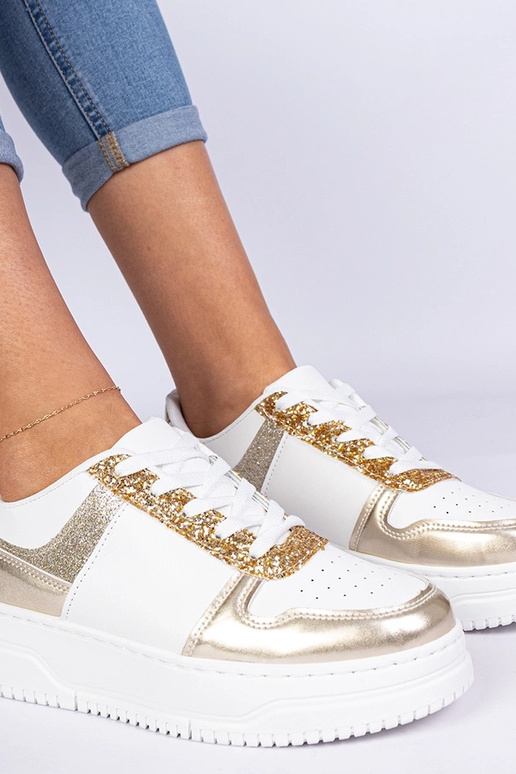 Goldene Damensneaker auf dicker Sohle... Goldene Damensneaker auf dicker Sohle...