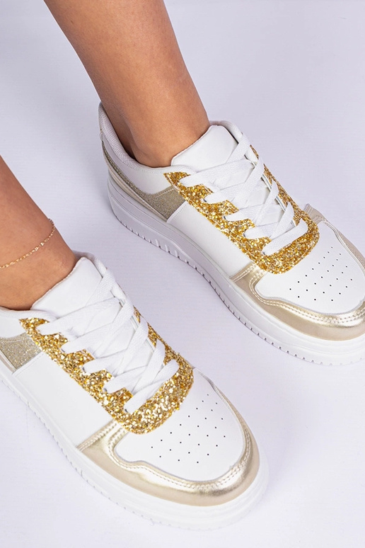 Goldene Damensneaker auf dicker Sohle... Goldene Damensneaker auf dicker Sohle...