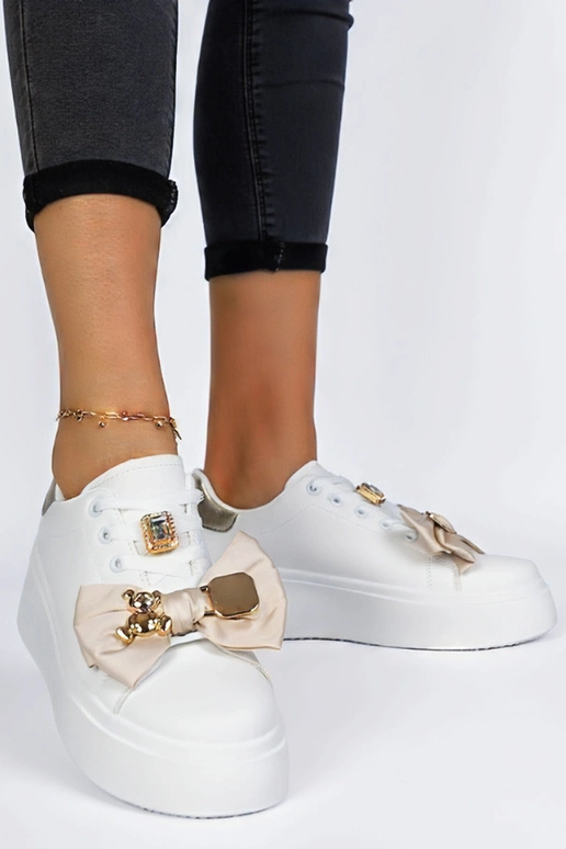 Milonel weiß-goldene Sneakers für Damen Milonel weiß-goldene Sneakers für Damen