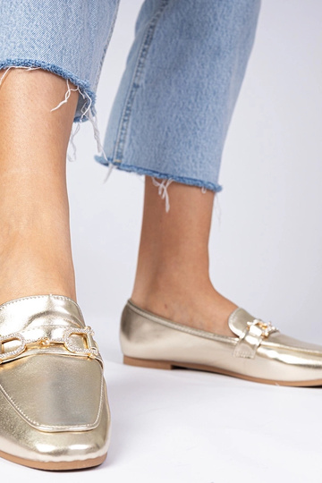 Goldene elegante Mokassins...