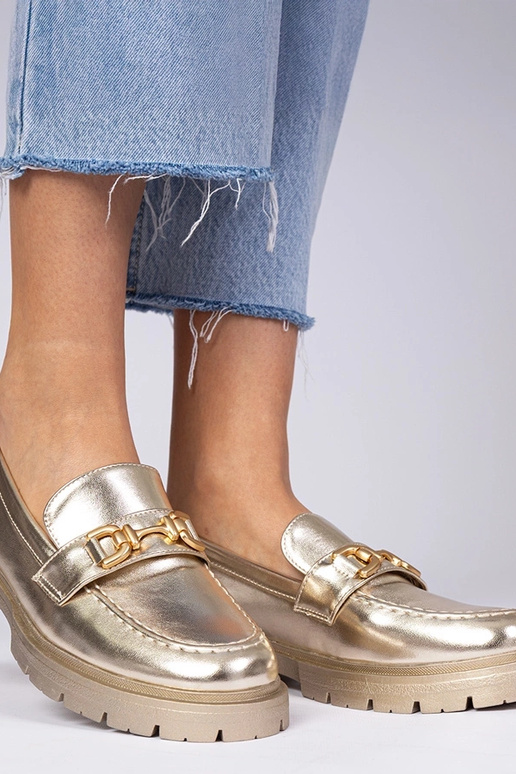 Goldene elegante Mokassins aus... Goldene elegante Mokassins aus...