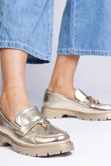 Goldene elegante Mokassins...