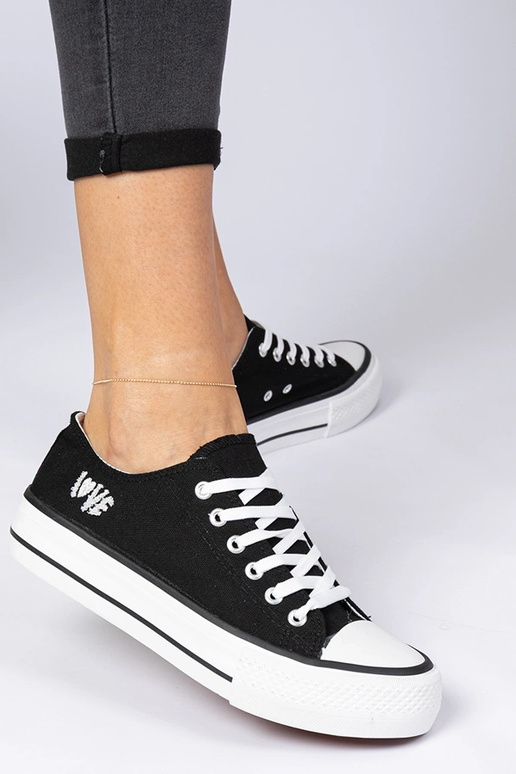 Schwarze klassische Damen-Sneakers... Schwarze klassische Damen-Sneakers...