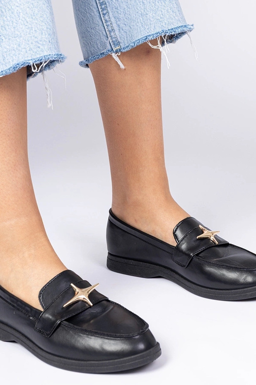 Schwarze Damenmokassins mit goldener... Schwarze Damenmokassins mit goldener...