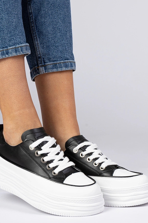 Schwarz-weiße Damen Sneakers mit... Schwarz-weiße Damen Sneakers mit...