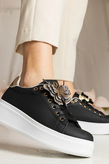 Schwarze Sneakers mit... 2