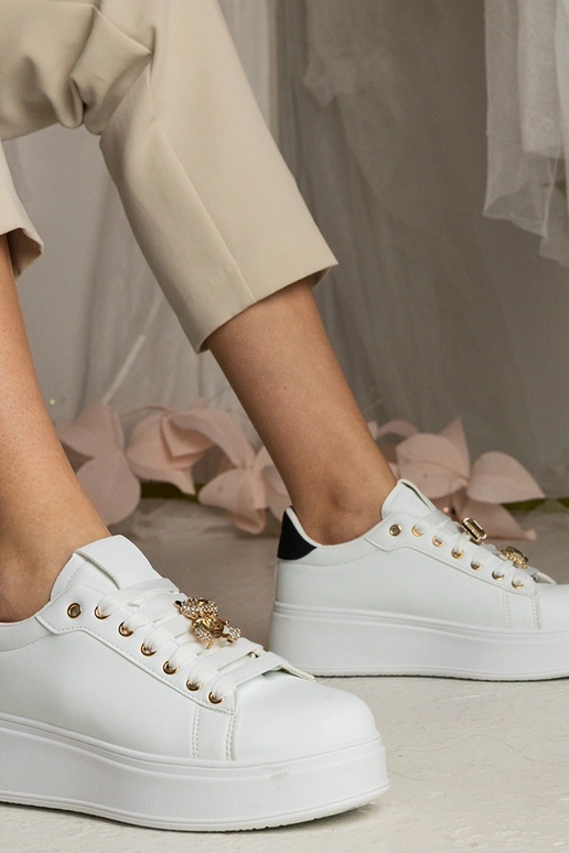 Schwarz-weiße Damen Sneakers mit... Schwarz-weiße Damen Sneakers mit...