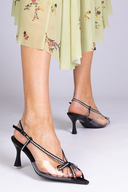 Schwarze transparente Sandalen mit...