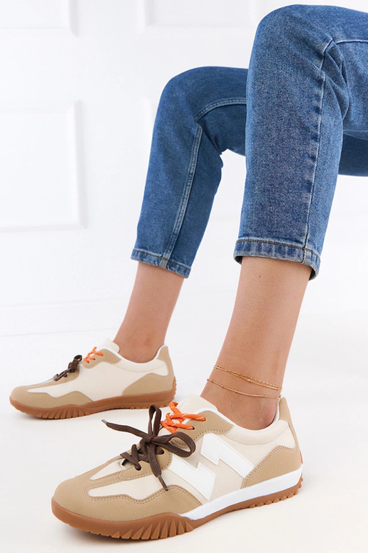 Sandfarbene Sportschuhe mit bunten...