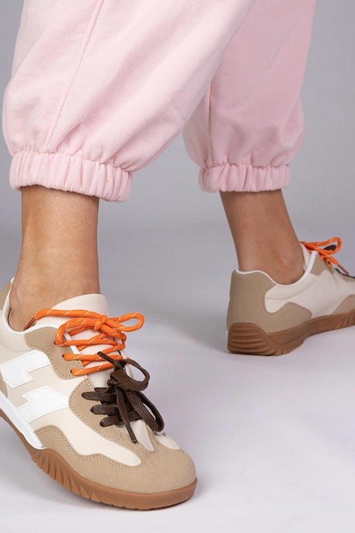 Sandfarbene Sportschuhe mit bunten...