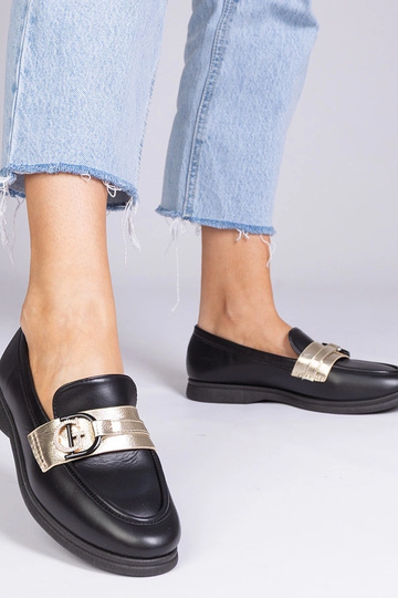 Schwarze Mokassins aus...