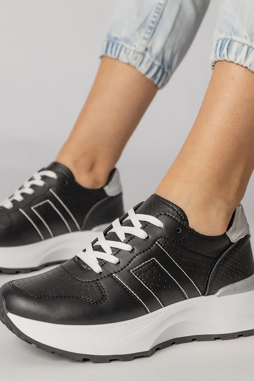 Schwarze Sportschuhe mit silbernem...