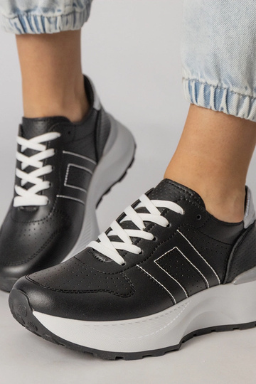 Schwarze Sportschuhe mit... 2