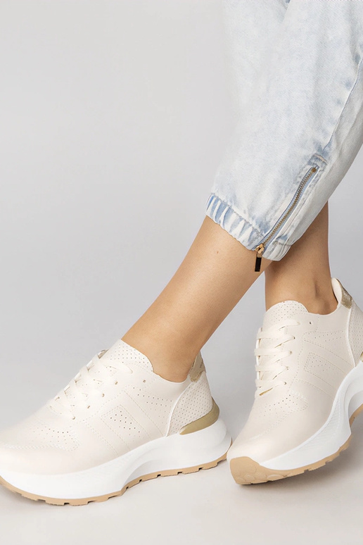 Sandfarbene Sportschuhe mit goldenem...