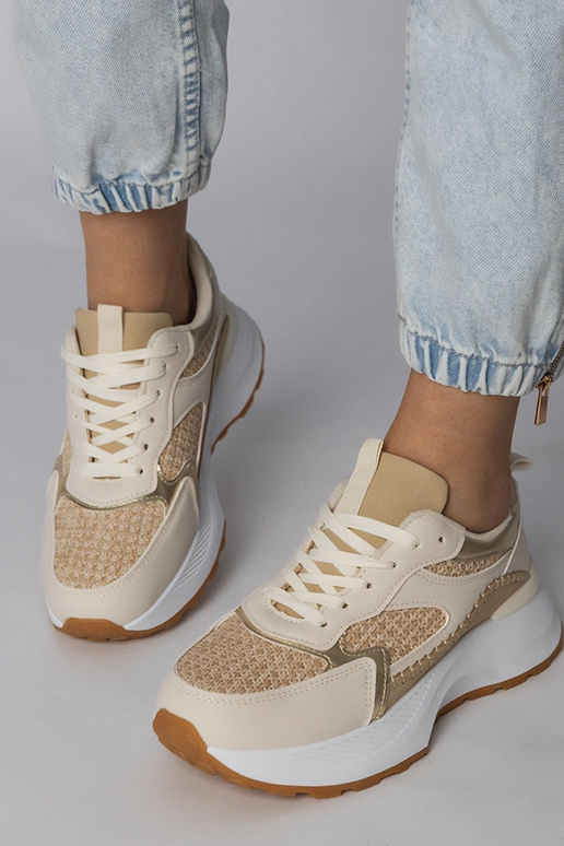 Sandfarbene Sportschuhe mit...