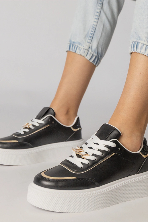 Schwarze Sportschuhe mit Glitzer und...