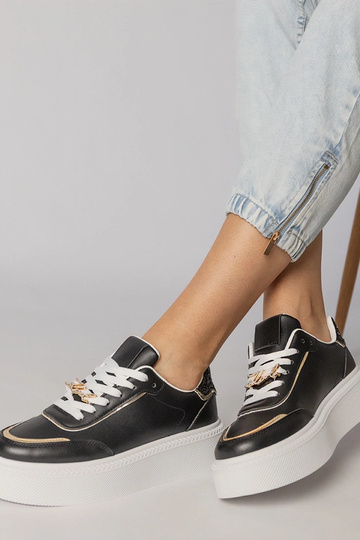 Schwarze Sportschuhe mit... 2
